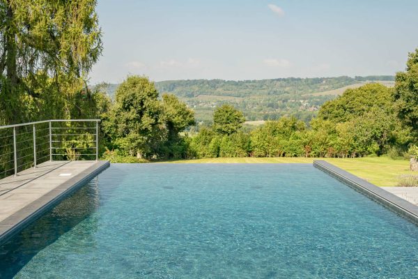 infinity edge pool with views of the countryside