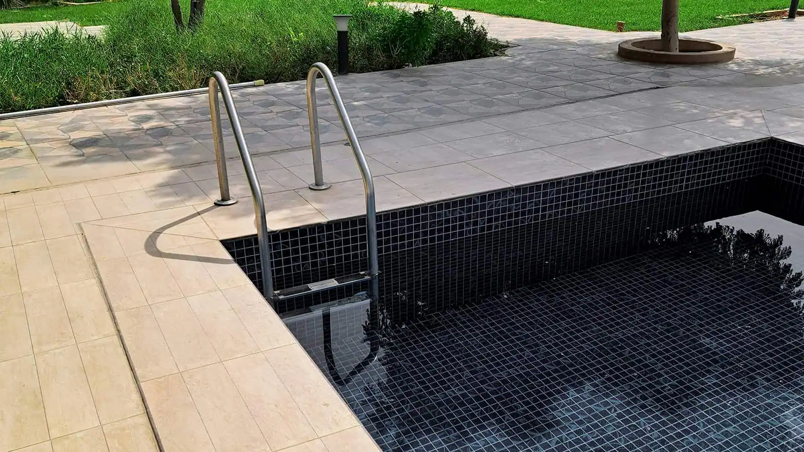 Dark tiled swimming pool